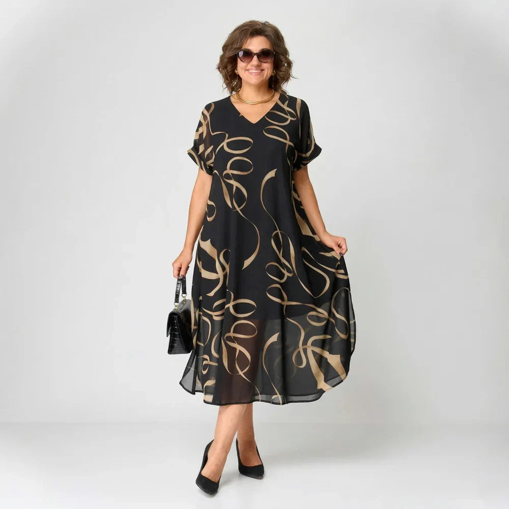 Patricia - Vestido con volante y estampado dorado