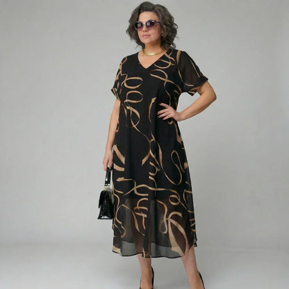 Patricia - Vestido con volante y estampado dorado