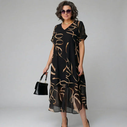 Patricia - Vestido con volante y estampado dorado