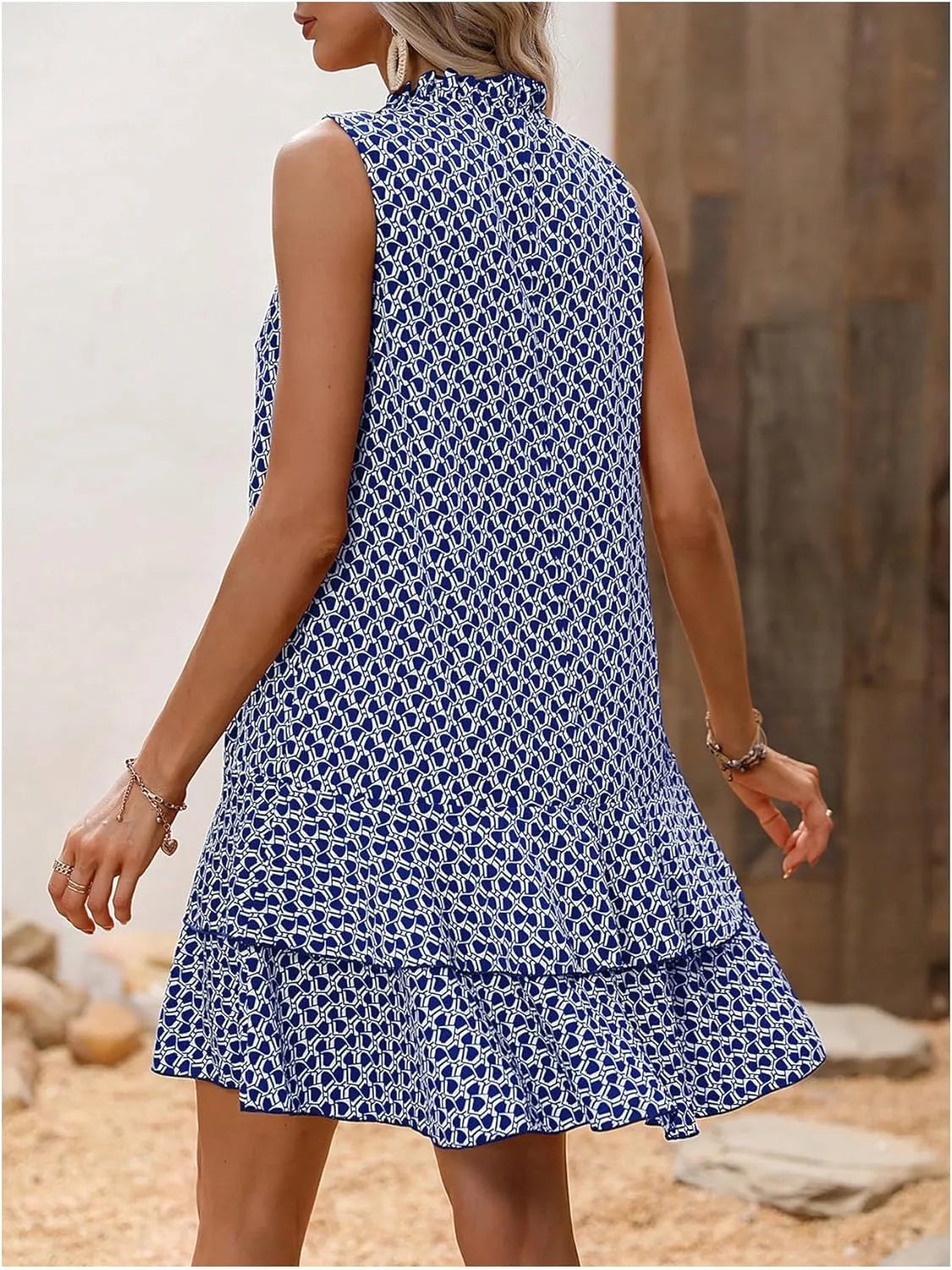 Flor - Vestido sin mangas con estampado elegante y caída fluida