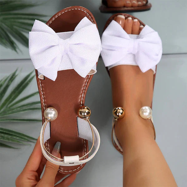 Liora - Sandalias de tiras elegantes con detalle de perla
