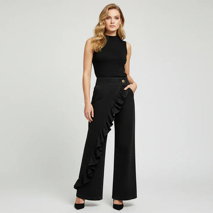 Violeta - Pantalones vaqueros asimétricos con volante y pierna ancha