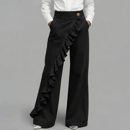 Violeta - Pantalones vaqueros asimétricos con volante y pierna ancha